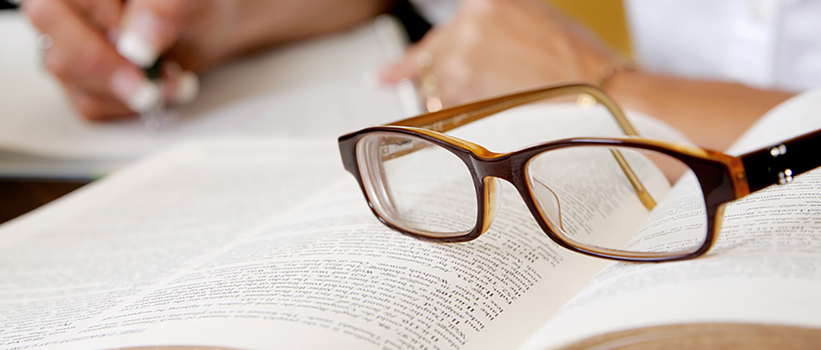 Executive Compensation Expert Witness taking notes